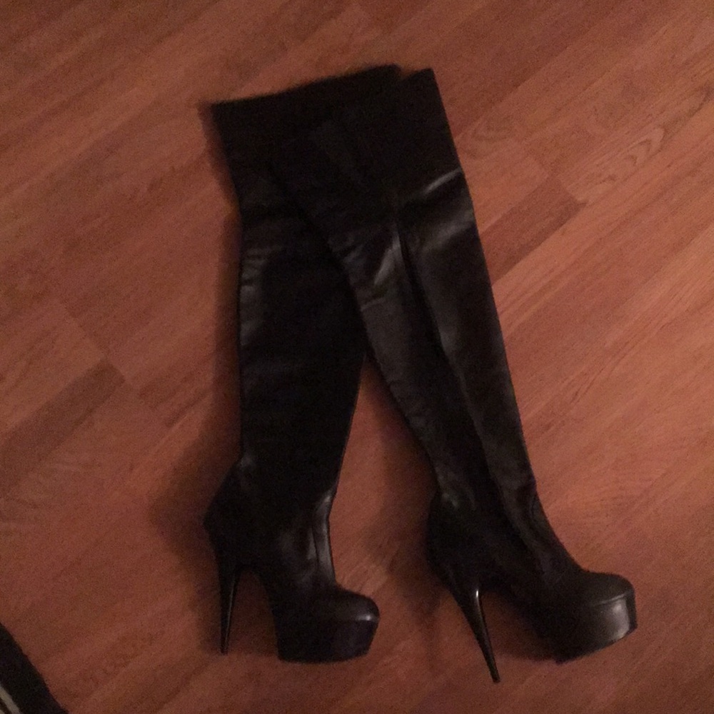 Black thigh high catwalk boots